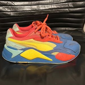 Blue, Orange, and Yellow Pumas Men’s size 8.5